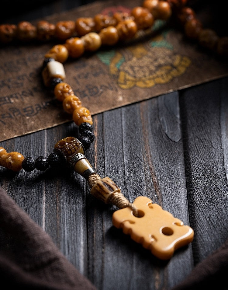 Tibetan Natural Yak Bone Skull Carved Buddha Bead Bracelet | 108 Bead Tibetan Bracelet