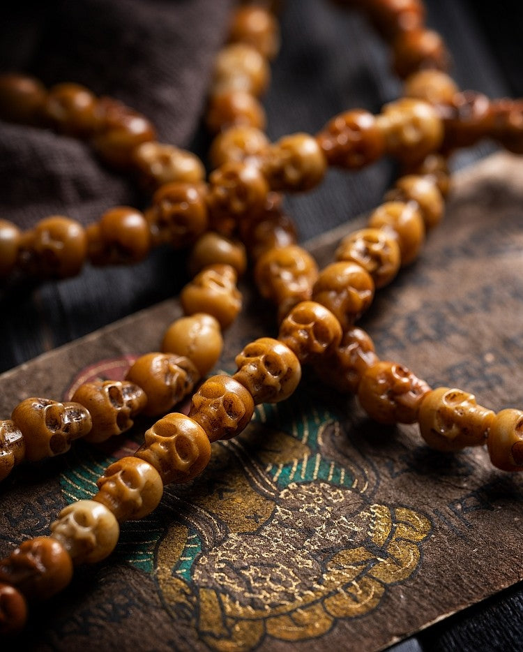 Tibetan Natural Yak Bone Skull Carved Buddha Bead Bracelet | 108 Bead Tibetan Bracelet