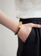 Bracelet œil de tigre et cristal « Golden Amber Wisdom »